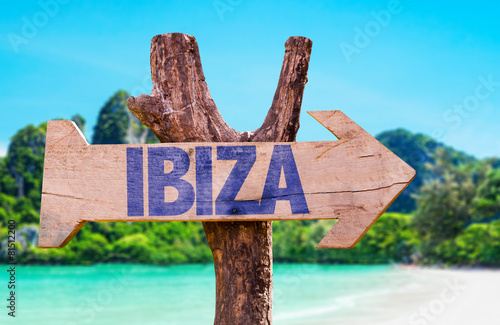 Ibiza wooden sign with beach background
