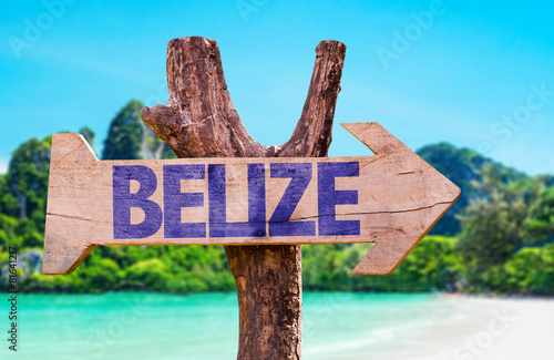 Belize wooden sign with beach background