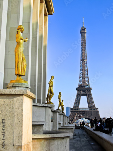 View of the statues and Eiffel Tower in Paris, France