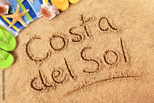 Costa del Sol words written in sand spain spanish summer vacation holiday photo