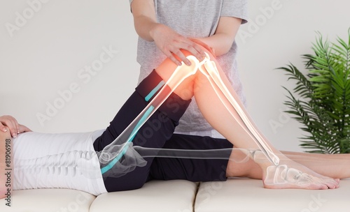 Highlighted bones of woman at physiotherapist