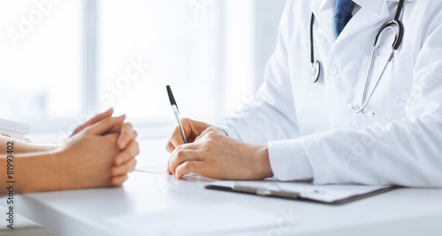 patient and doctor taking notes