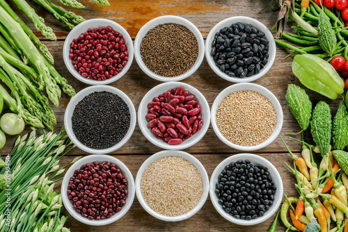 Muticoloured bean with fresh vegetables on the tables