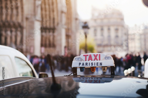 taxi parisien, sign Taxi on the roof of the car in Paris