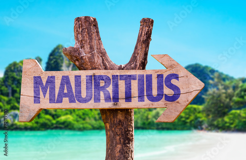 Mauritius wooden sign with beach background