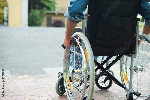 Disabled man trying to getting on a ramp