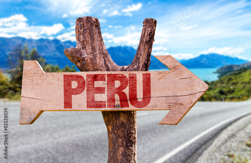 Peru wooden sign with road background