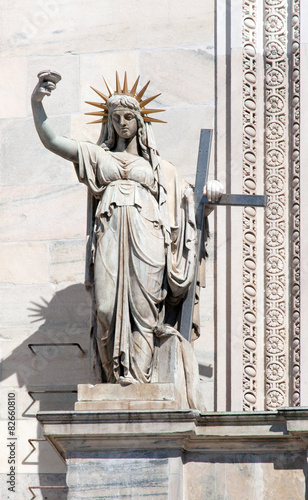 Statue representing the New Law on the Milan Cathedral's facade
