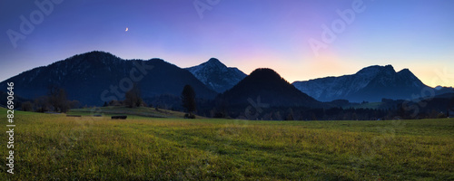 Evening panorama of Alps mountains with moon, Upper Austria