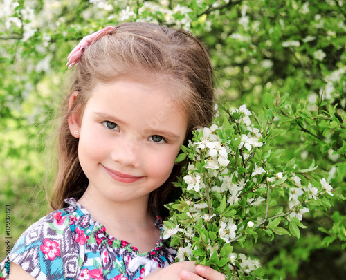 Portrait of adorable smiling little girl