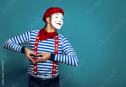 mime in red beret smiles