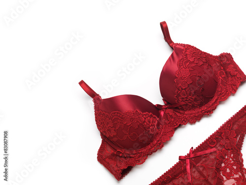 Red lacy lingerie on white background