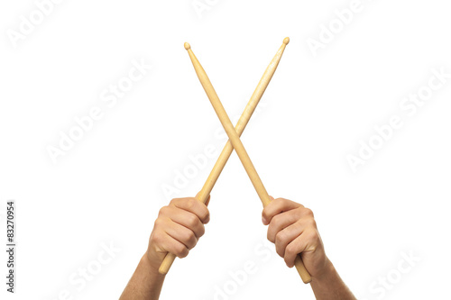 Male hands holding drum sticks.isolated backgrund