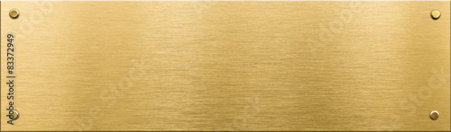 gold metal plaque or nameboard with rivets 