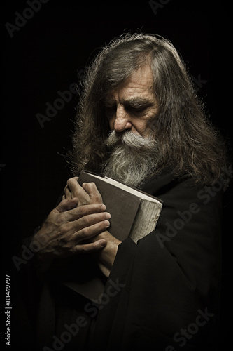 Senior Prayer, Old Man Praying with Hands on Bible Book