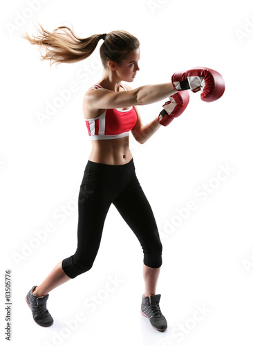 Boxing woman punching wearing boxing gloves