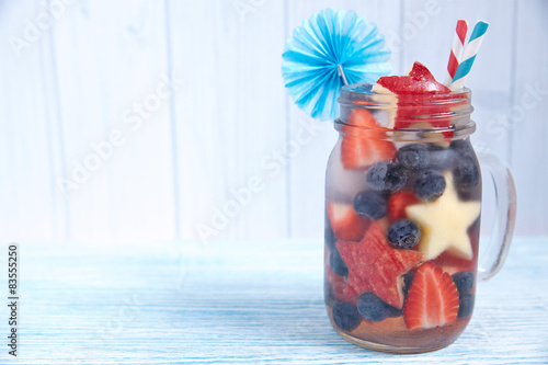 Cocktail with strawberry, blueberry and apple