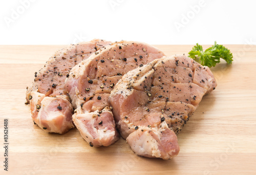 raw meat pork steak with black pepper