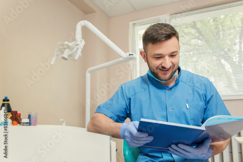 Portrait of young dentist in the dental office
