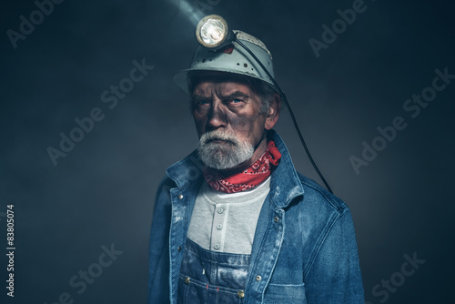 Humorless Bearded Old Miner Staring at the Camera