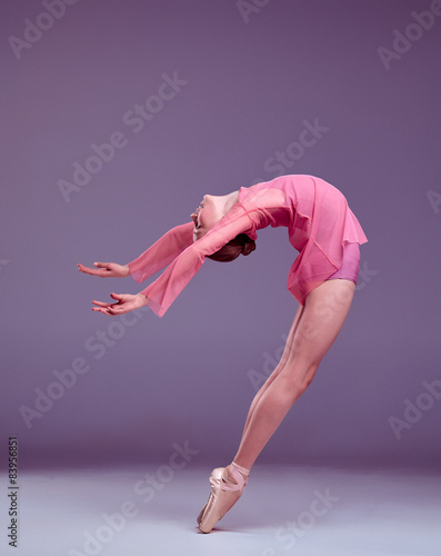Young ballerina dancer showing her techniques