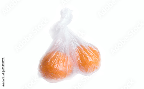 Oranges in plastic bag.
