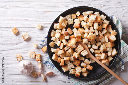 Homemade croutons in a bowl horizontal view top 