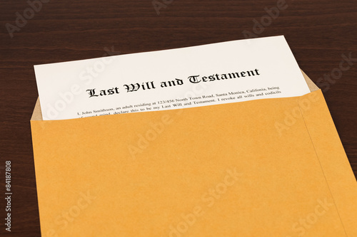 Last will on cream color paper in opened envelope