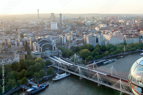 Beautiful view on London's north-western part from London Eye tourist attraction wheel: cityscape, BT Tower, Charing Cross Station, Centre Point and bridge over Thames river