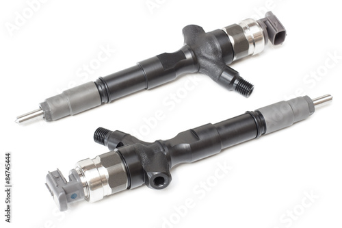 Two new nozzle for diesel fuel on a white background