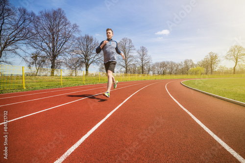 Amateur runner on a track