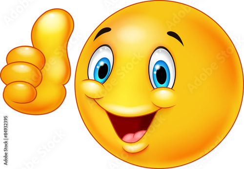Happy smiley emoticon giving thumbs up