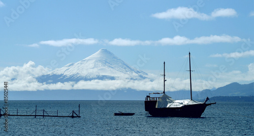caravel anchored in front of the volcano Osorno, Chile 