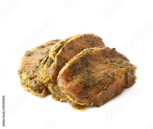 Three marinated beef slices isolated