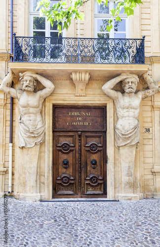 Entrance of the commercial court with statues in Aix en Provence