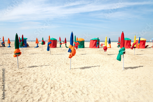 Colorful tents and umbrellas on famous Deauville beach, Normandy