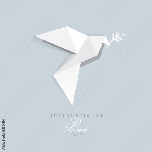 international day of peace- vector illustration of white origami dove with olive branch- flat design style