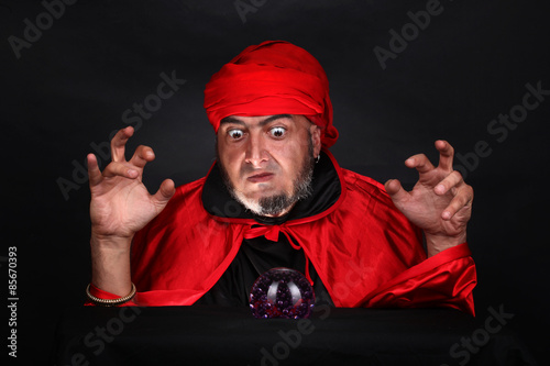 Soothsayer predicts future fortune telling using magic crystal ball