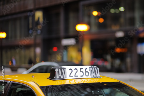 Taxi sign in big city