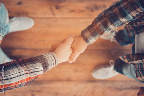 Men shaking hands. 