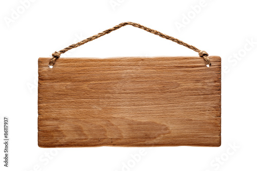 wooden signboard hanging from a rope