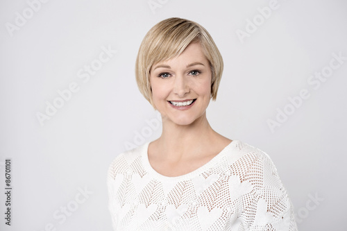 Casual pose of smiling middle aged woman