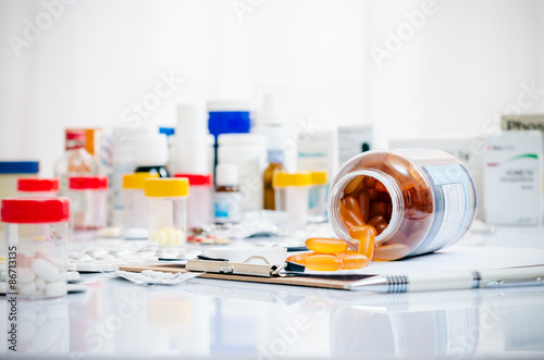 medicine capsules laid out on a folder