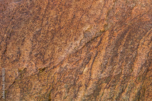 Fond en roche mouillée couleur chaude le Pouldu Bretagne