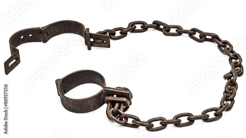 Old chains or shackles used for locking up prisoners or slaves between 1600 and 1800.