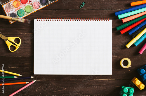 School supplies and blank notebook