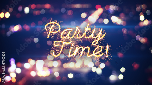 party time sparkler text and city bokeh lights