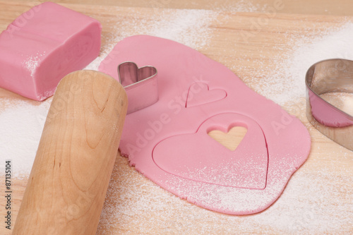 Pink Icing Sugar On Wooden Board