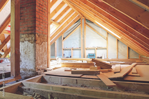 an interior view of a house attic under construction