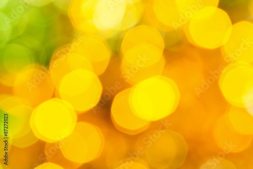 blurred yellow green big Christmas lights